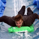 Illustration for article titled Would You Go For A Ride On This Massive Slip n Slide On A City Street?